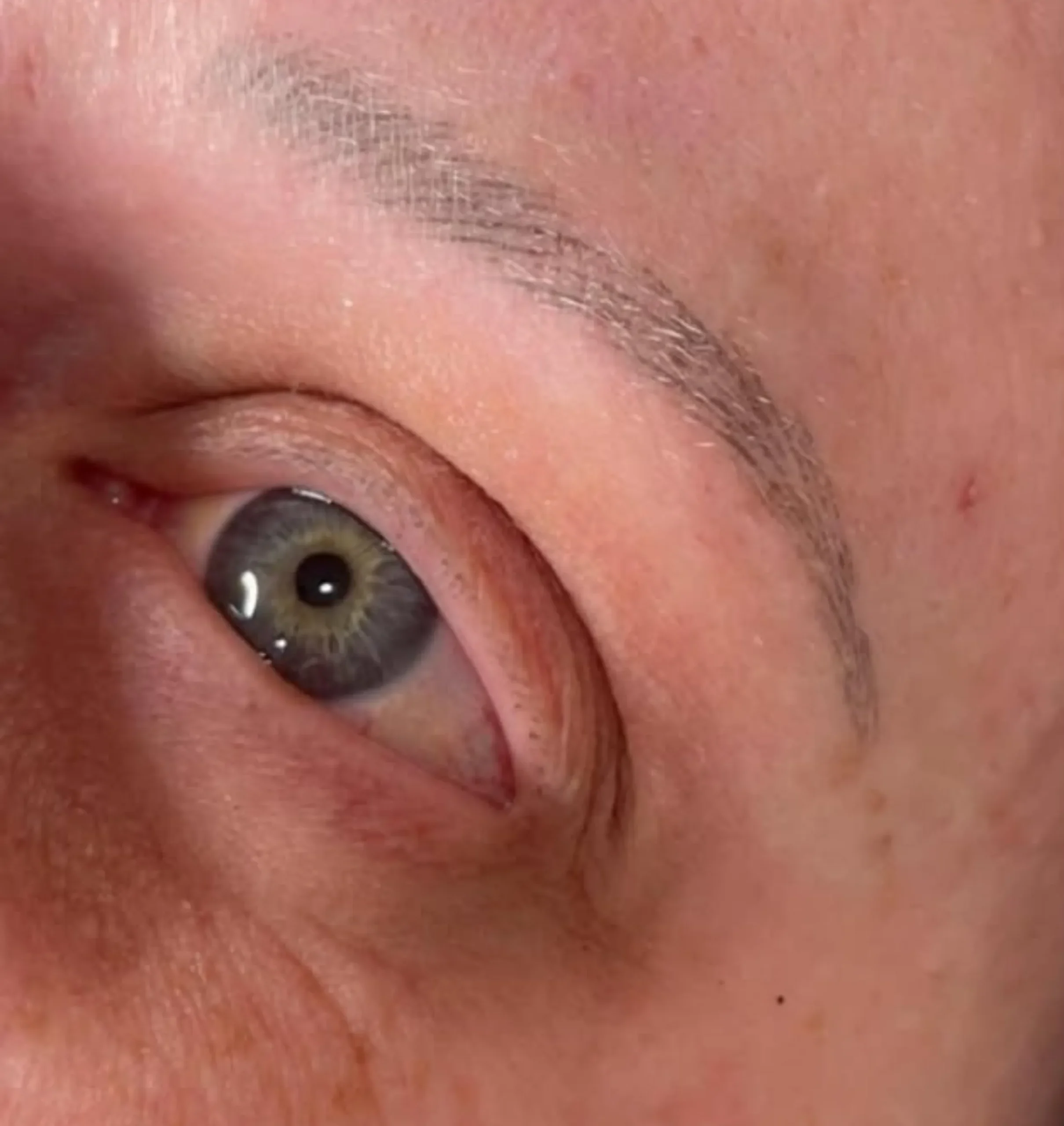 one eyebrow darker after microblading